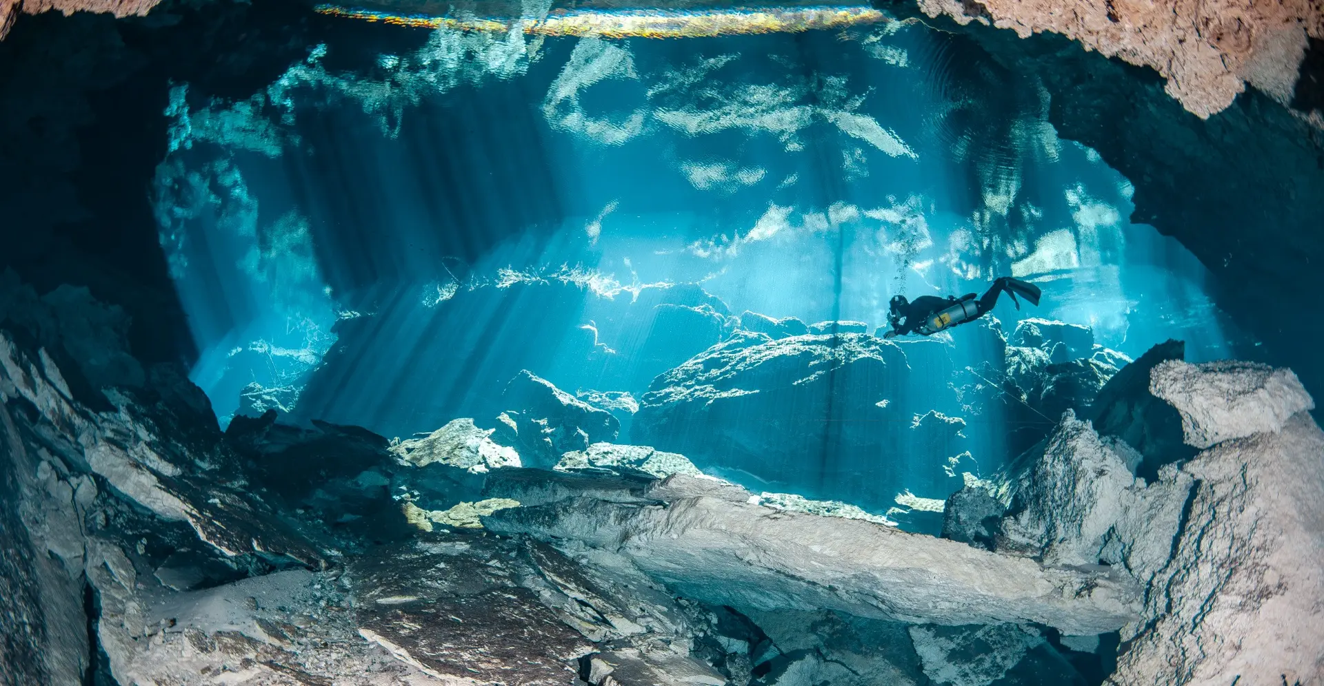 Sunlight entering a clear-water cenote